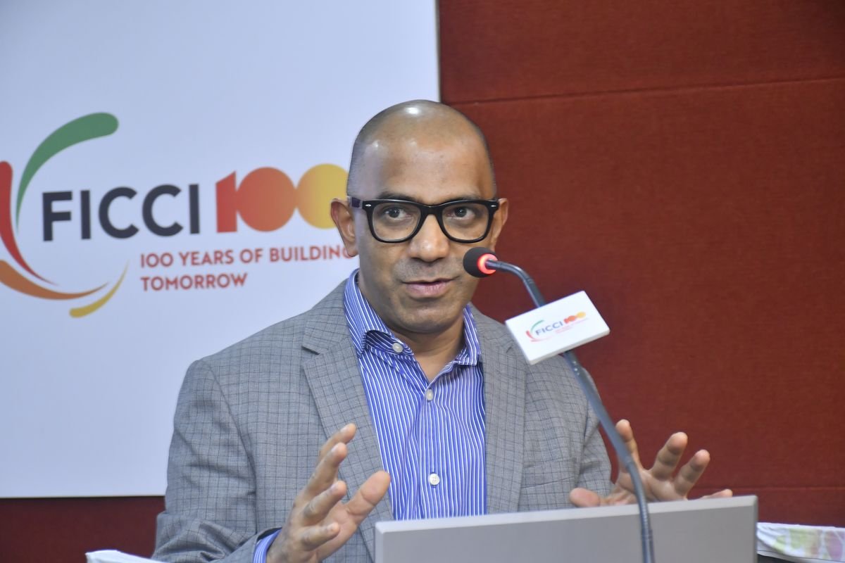 Dr. Anand Fadte speaking at the FICCI podium